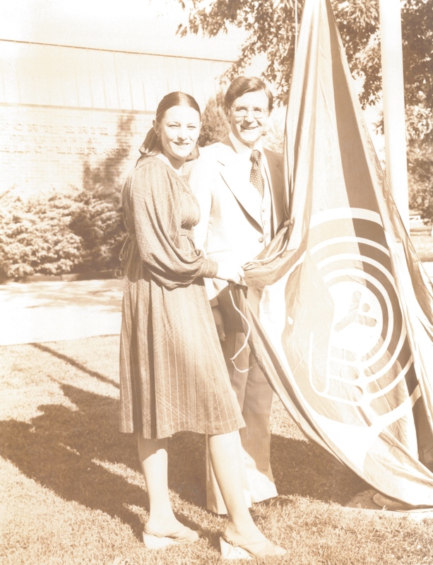 Mayor Girve Fretz and Debbie Sanlie Raise the United Way Flag