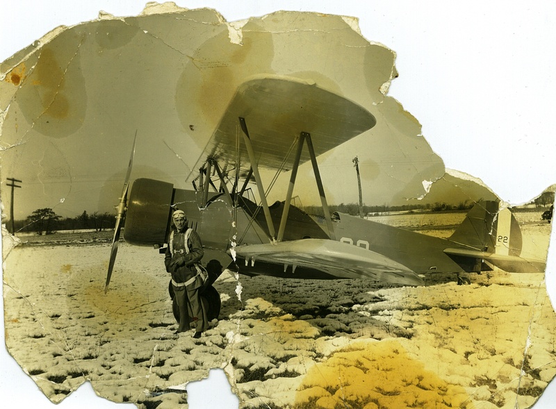 Man in front of Fleet Airplane