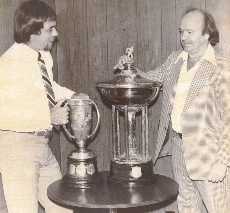 Men with Golf Trophy