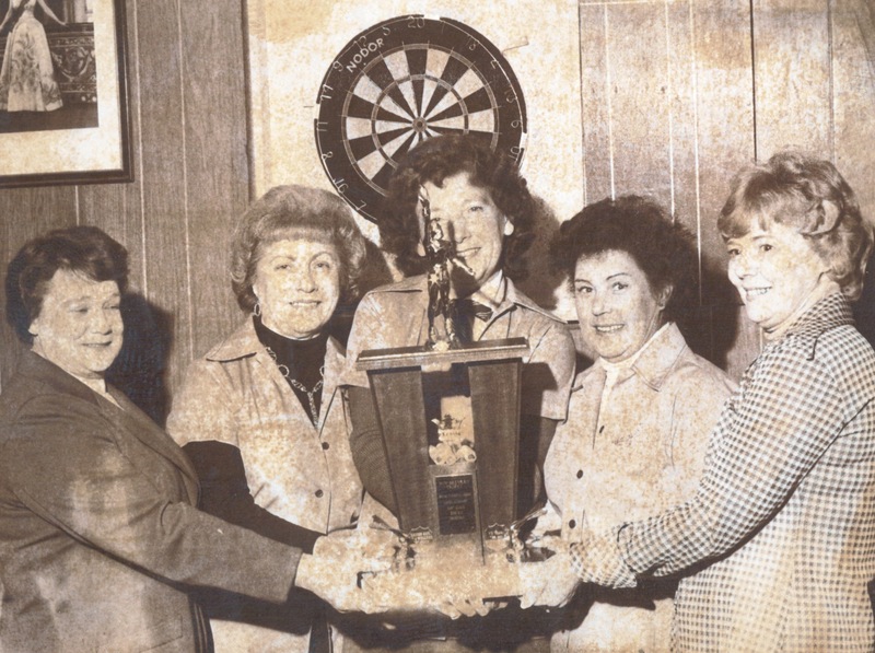 Women Holding Trophy