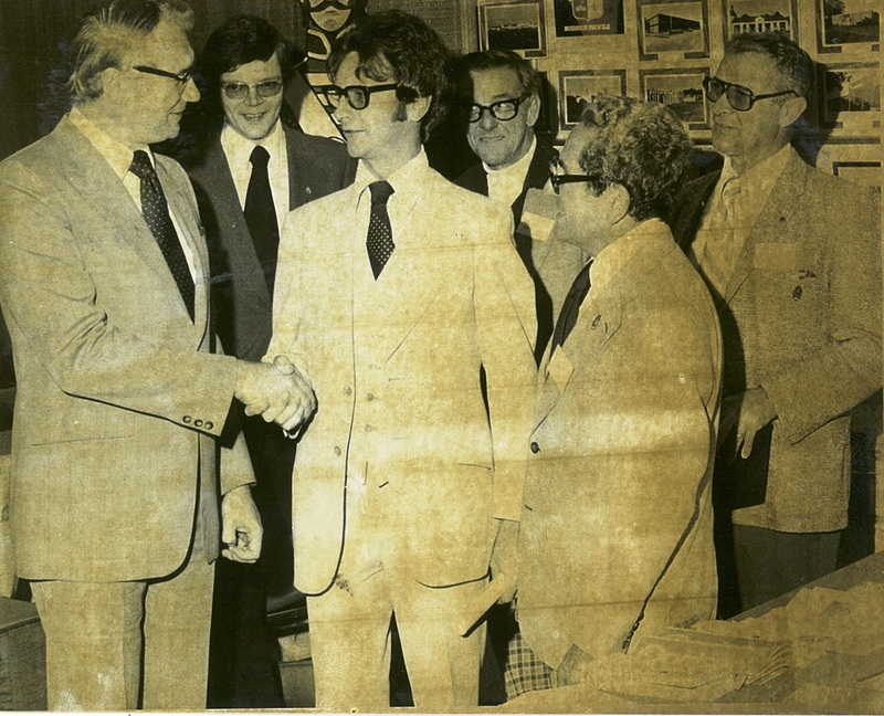 Suited Men Shaking Hands