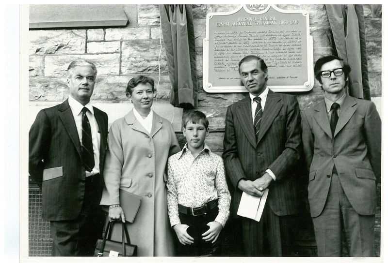 Unidentified Group Standing in Front of Ernest Cruikshank Plaque