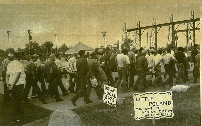 Production Workers Gather in Parking Lots