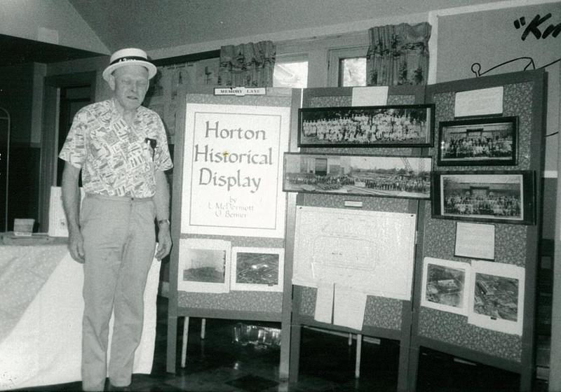 Unidentified Man in Front of Horton Steel Historical Display, #1