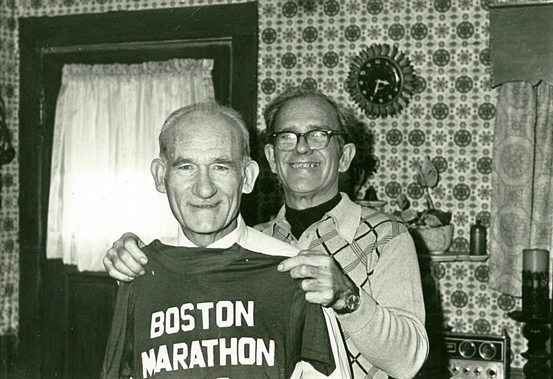 Louis McDermott Holding up Boston Marathon T-Shirt