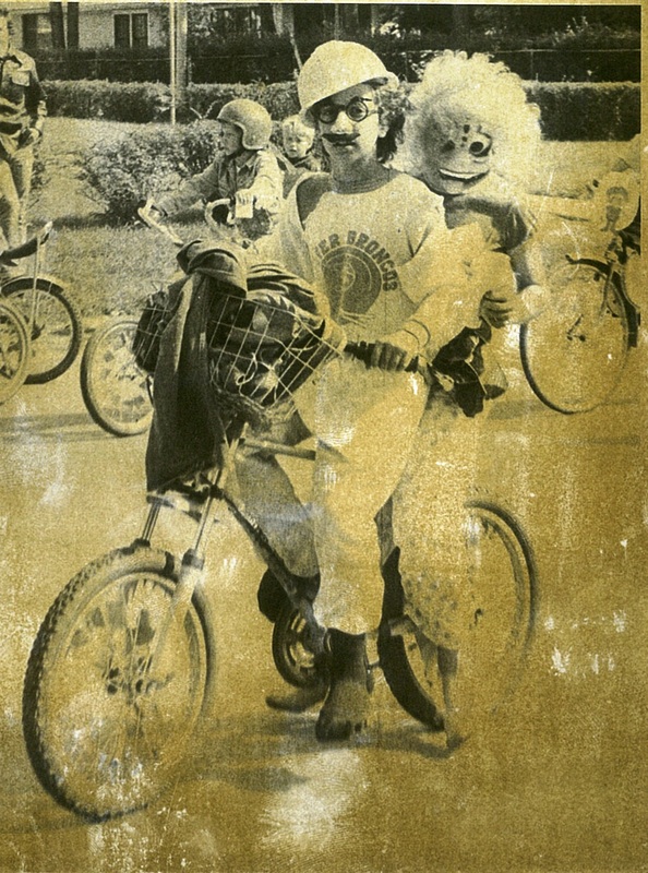 Boy and Costumed Friend on Bike at Harvest Festival